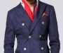 The red thread detailing on the cream horn buttons bring an otherwise typical navy double breasted blazer to life. Pay attention to the pick stitching on the lapels and the patch pockets.