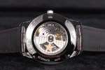 The Zenith Elite Captain with Central Seconds has a sapphire crystal caseback which displays superior decoration on the movement plates and weighted rotor.