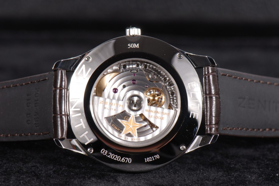The Zenith Elite Captain with Central Seconds has a sapphire crystal caseback which displays superior decoration on the movement plates and weighted rotor.